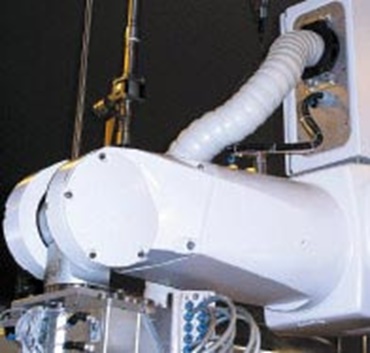 Multi-axis cable carriers in cleanroom